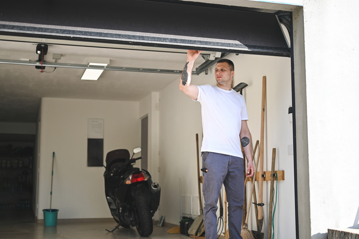 Importance of Spring Adjustment in Commercial Garage Door Maintenance